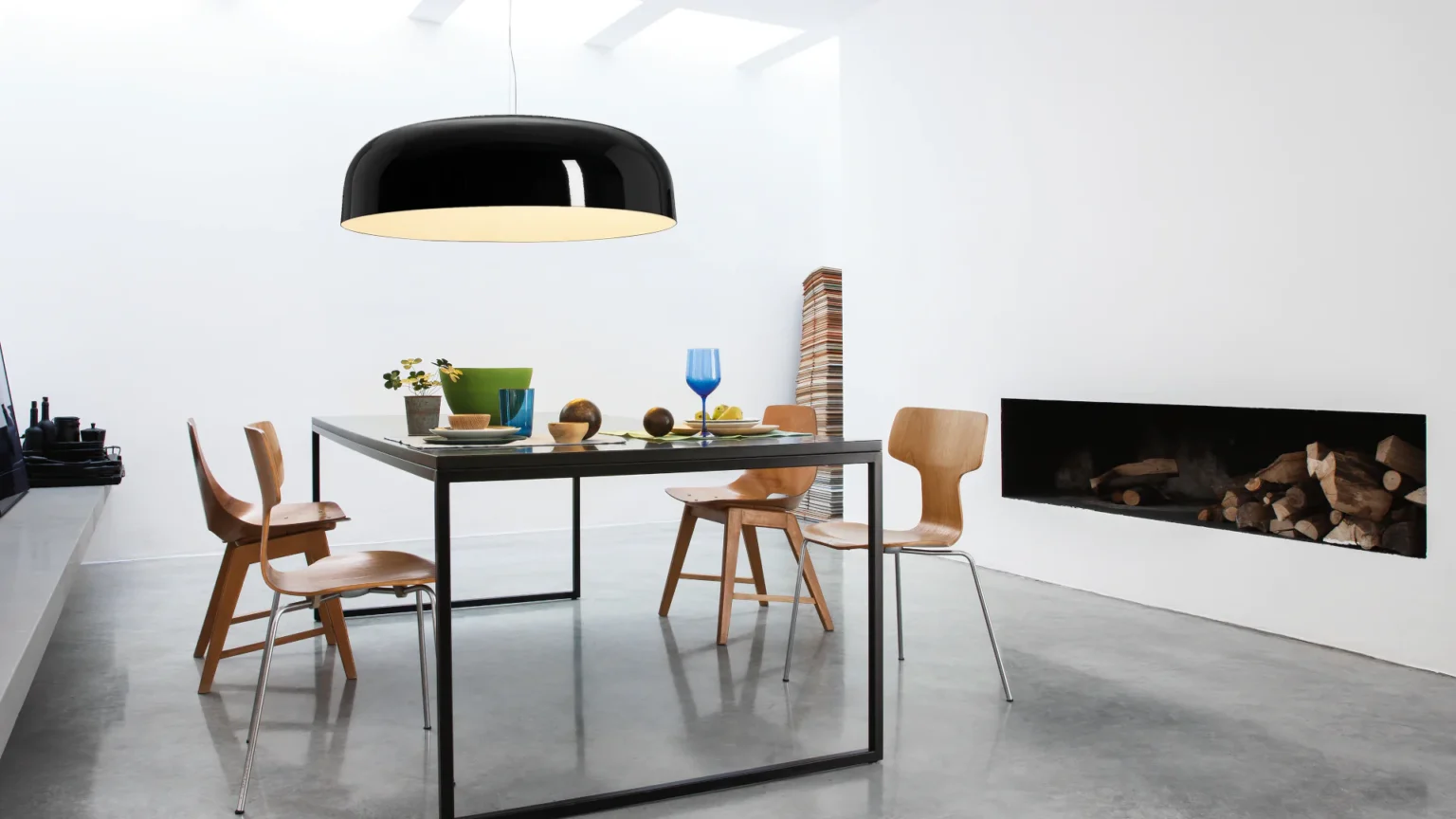 “Canopy by Oluce stylish Italian chandelier – artistic multi-tiered glass pendant with sleek metallic accents and ambient glow”