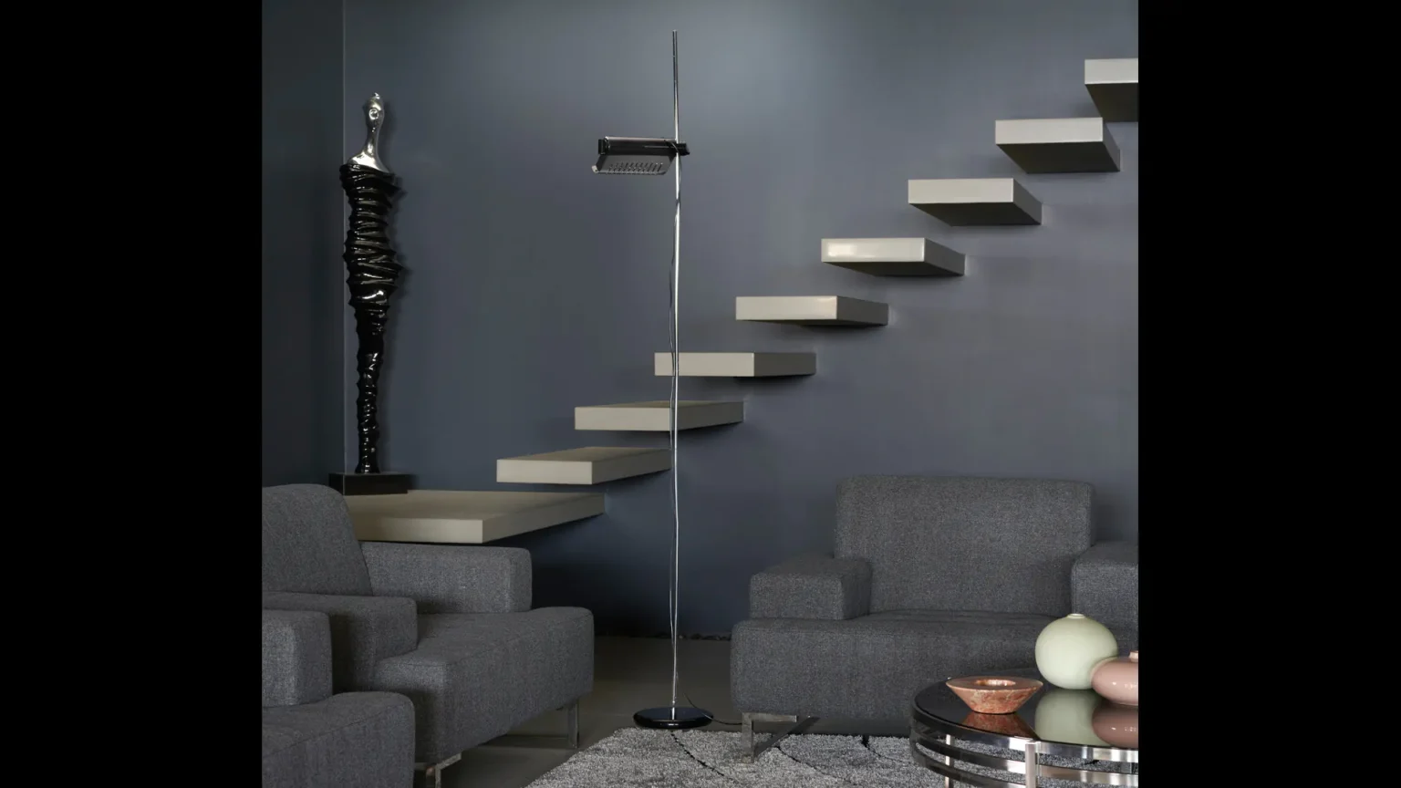 “Colombo by Oluce stylish Italian lamp – minimalist floor light featuring slender silhouette and soft ambient illumination”