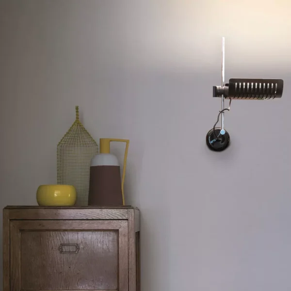 “Colombo by Oluce modern Italian floor lamp – sleek chrome structure with adjustable spotlight head and minimalist design”