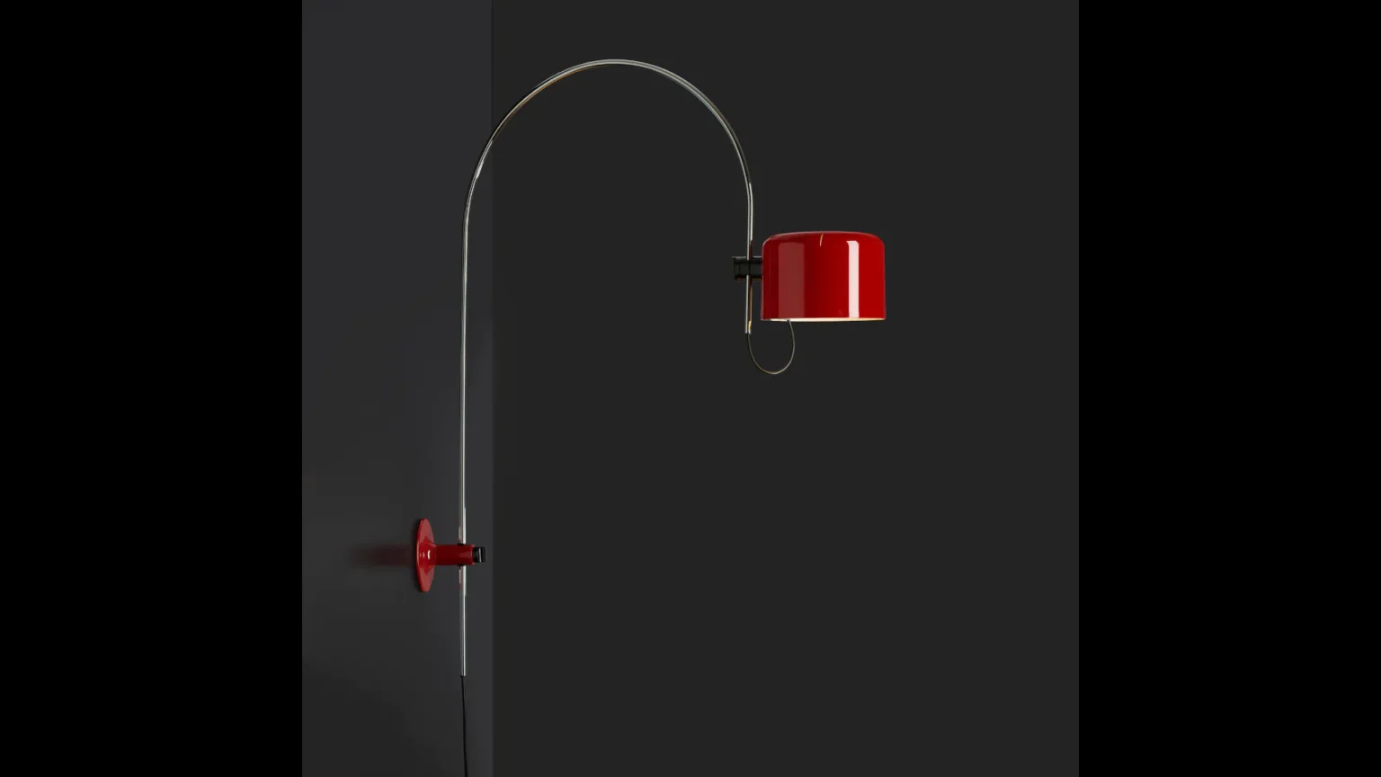 “Coupé by Oluce mid-century modern lamp – elegant adjustable spotlight with bold curves and polished chrome structure”