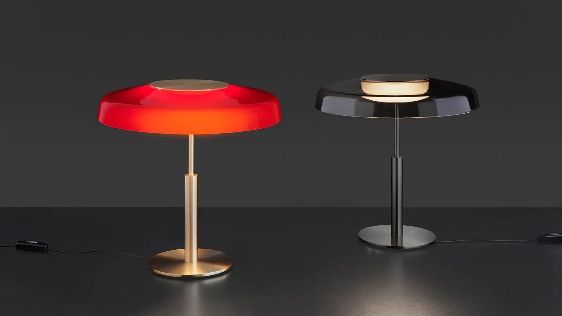 “Dora by Oluce stylish Italian lamp – sculptural table lamp featuring soft glowing diffuser and metal accents”