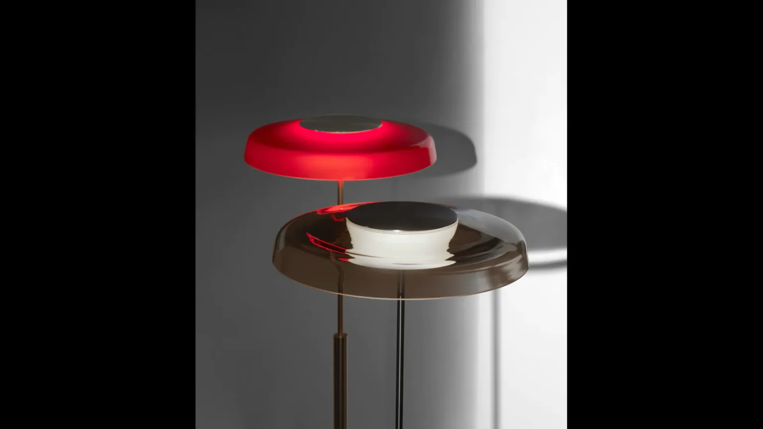 “Dora by Oluce stylish Italian lamp – sculptural table lamp with polished finish and refined proportions”