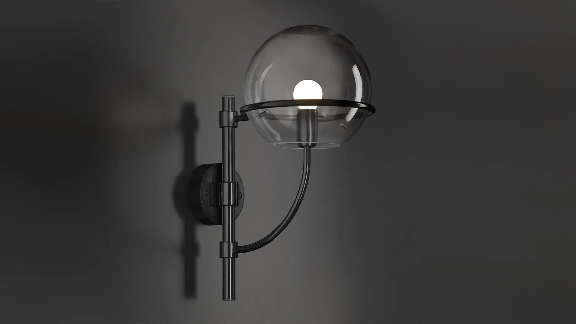 “Lyndon by Oluce modern Italian table lamp – spherical glass diffuser with polished metal base and minimalist elegant design”