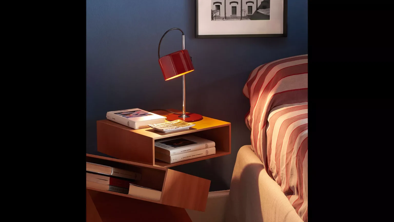 “Mini Coupé by Oluce iconic Italian lamp – mid-century style metal lamp with polished finish and clean lines”