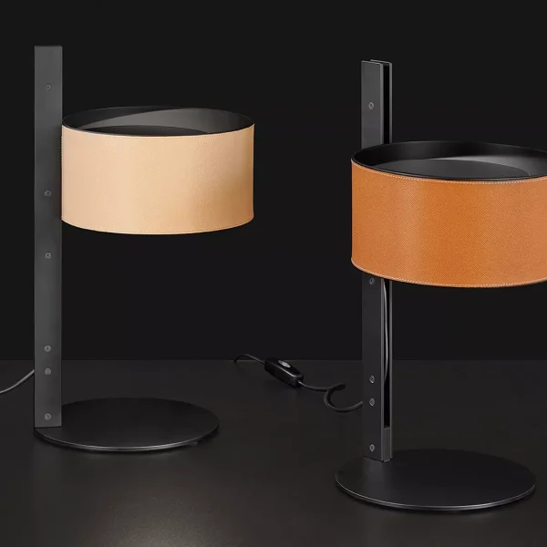 “Parallel by Oluce contemporary table lamp – sophisticated mix of materials with balanced architectural form”