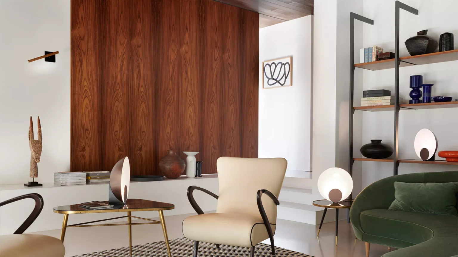 “Siro by Oluce modern Italian table lamp – circular metal structure with hidden light source and sculptural silhouette”
