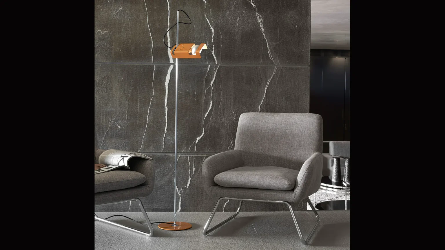 “Spider by Oluce designer lighting – contemporary swivel head lamp with polished chrome finish and minimalist base”