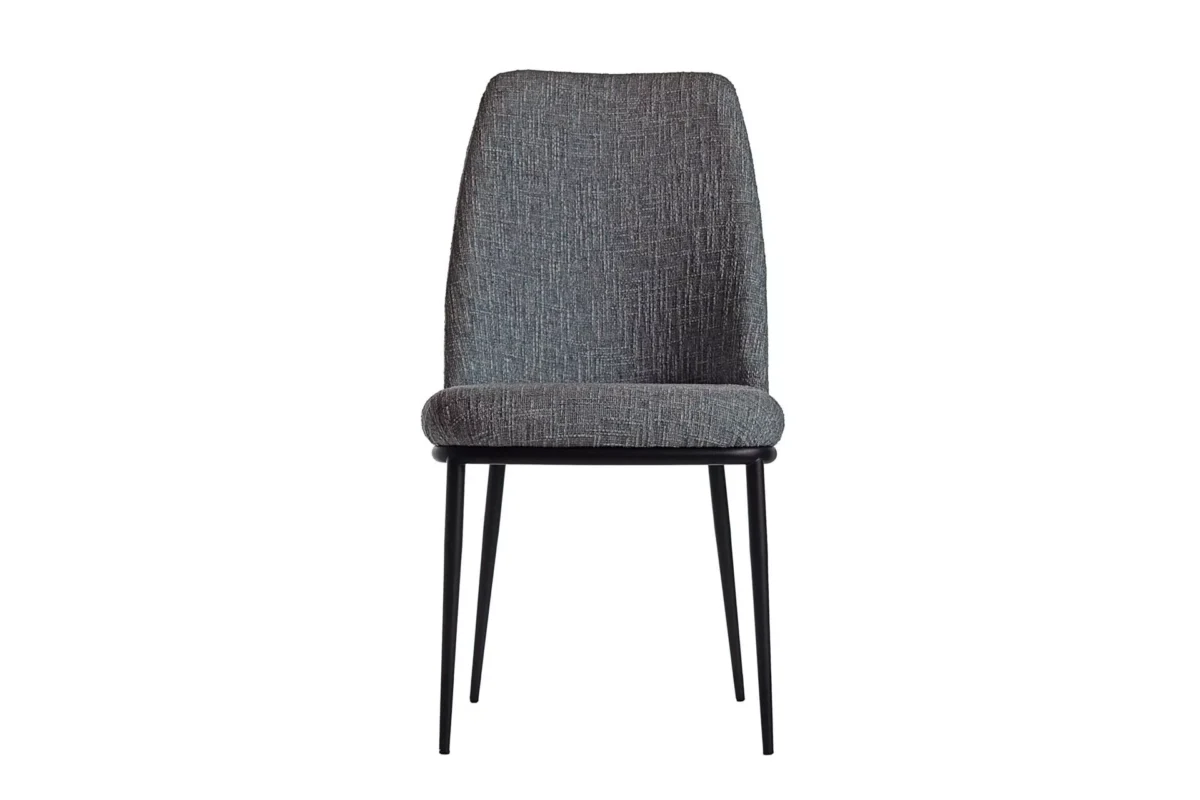 Opus XL high-back dining chair by Peressini in muted teal fabric with four tapered epoxy-coated legs, set on a plain white background.