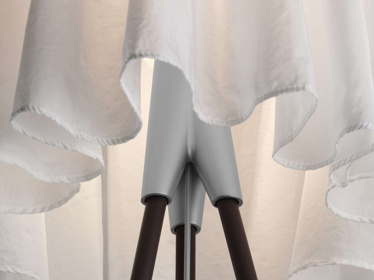 Rosy Angelis Floor Lamp by Flos side profile highlighting tall tripod frame and diffused canopy in a Troy Michigan setting