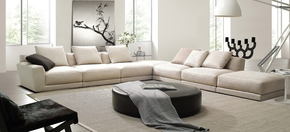 Compact pouf with fabric finish