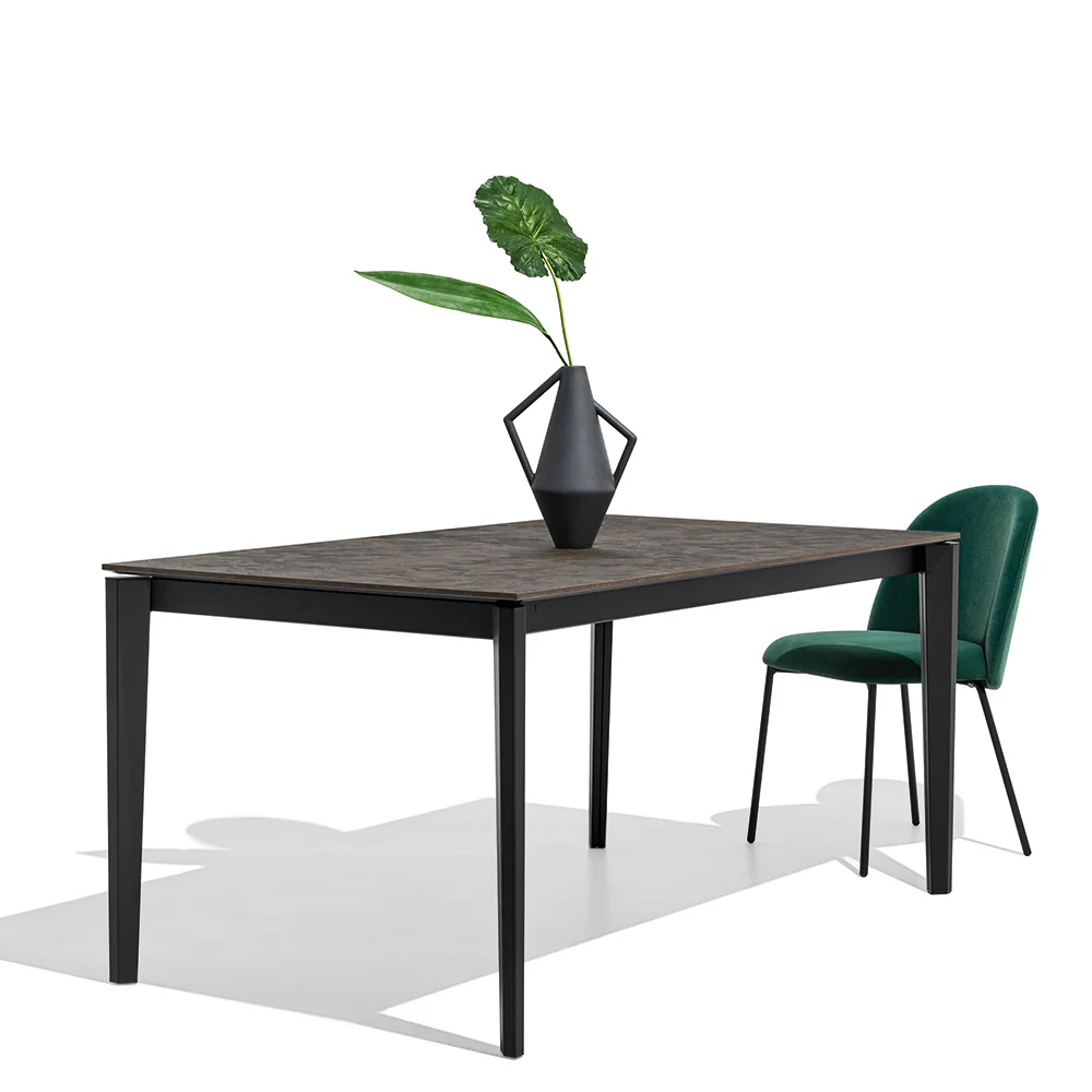 “Side view of PENTAGON table by Connubia – contemporary geometric table with compact footprint and sculptural legs”