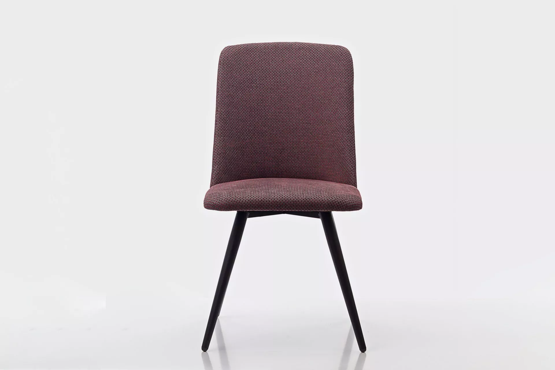 Modern Agata chair by Peressini in sleek black upholstery with metal legs on a white background.