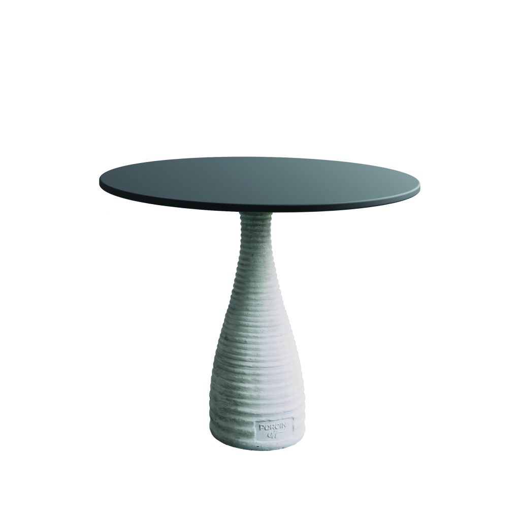 Low round PORCIN’OFF table with ribbed concrete pedestal base and copper-black steel top