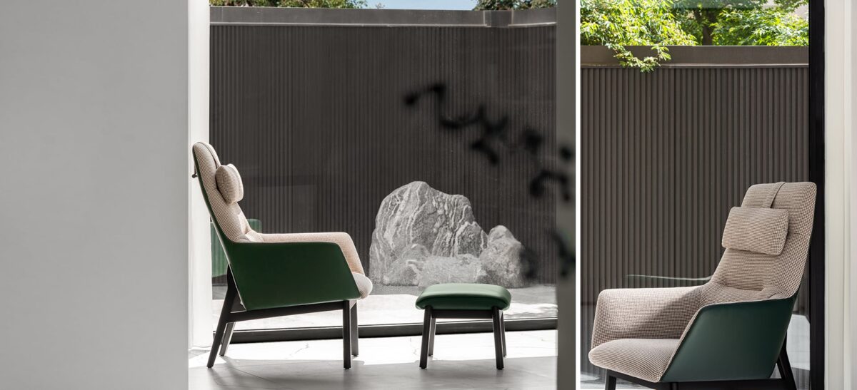Modern high-back armchair with streamlined design and plush upholstery by Camerich.