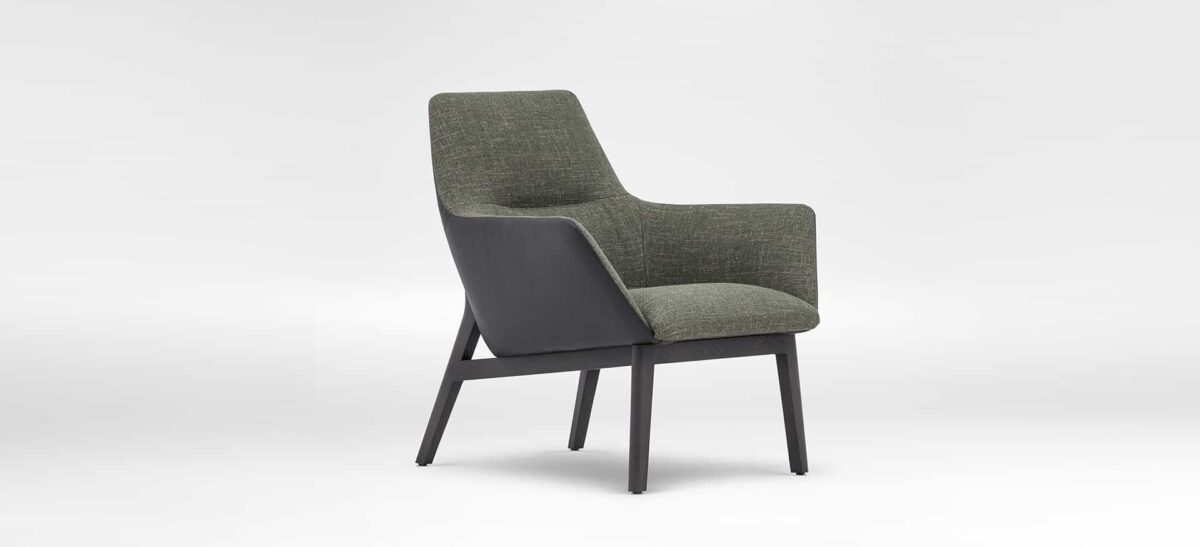 Comfortable low-back chair with smooth upholstery and wooden base by Camerich.
