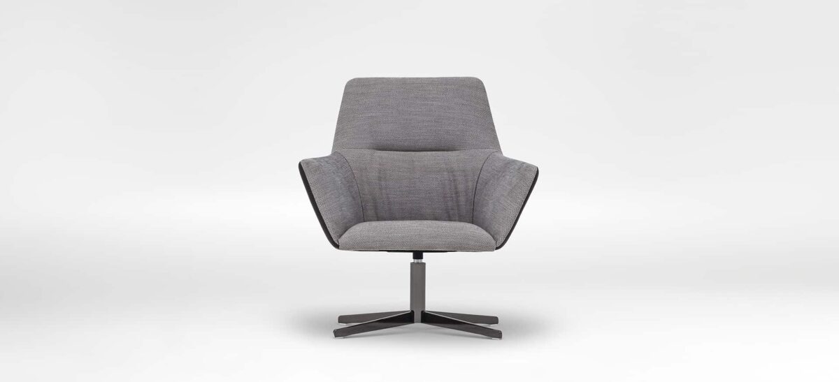 Minimalist low-back chair with clean silhouette and soft seating by Camerich.