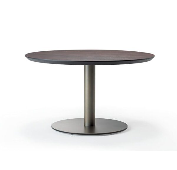 Modern round glass table in Troy Michigan showroom