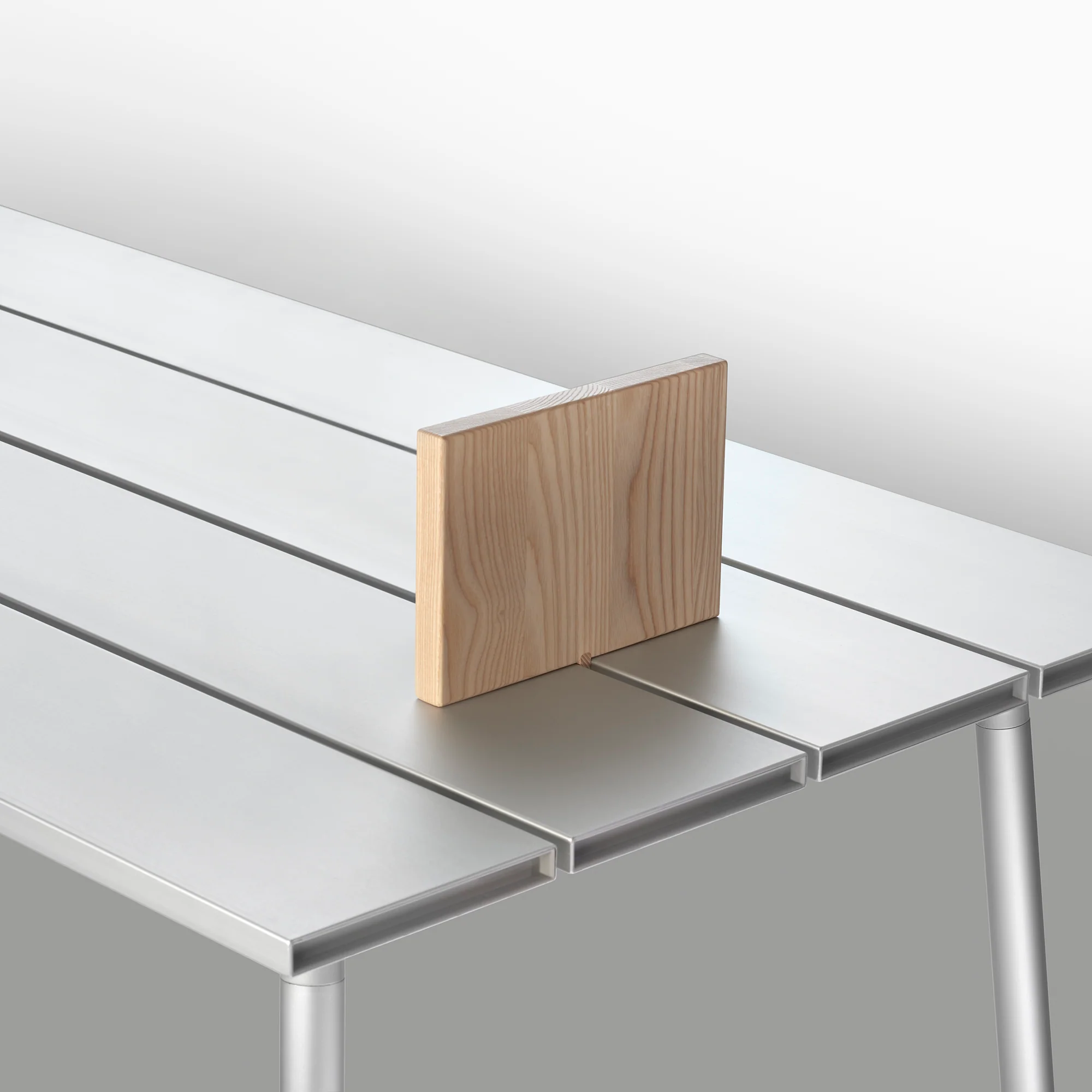 Modern wooden bookend from Emeco's Run collection, designed by Sam Hecht and Kim Colin.