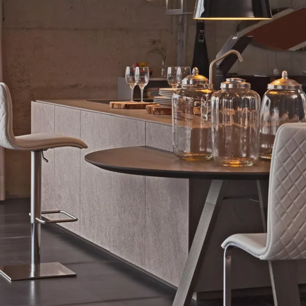 Peressini Rio dining chair with a sleek cantilever design, featuring a brushed steel frame and upholstered seat and back in premium faux leather, available in Grey, Light Grey, and Blue.