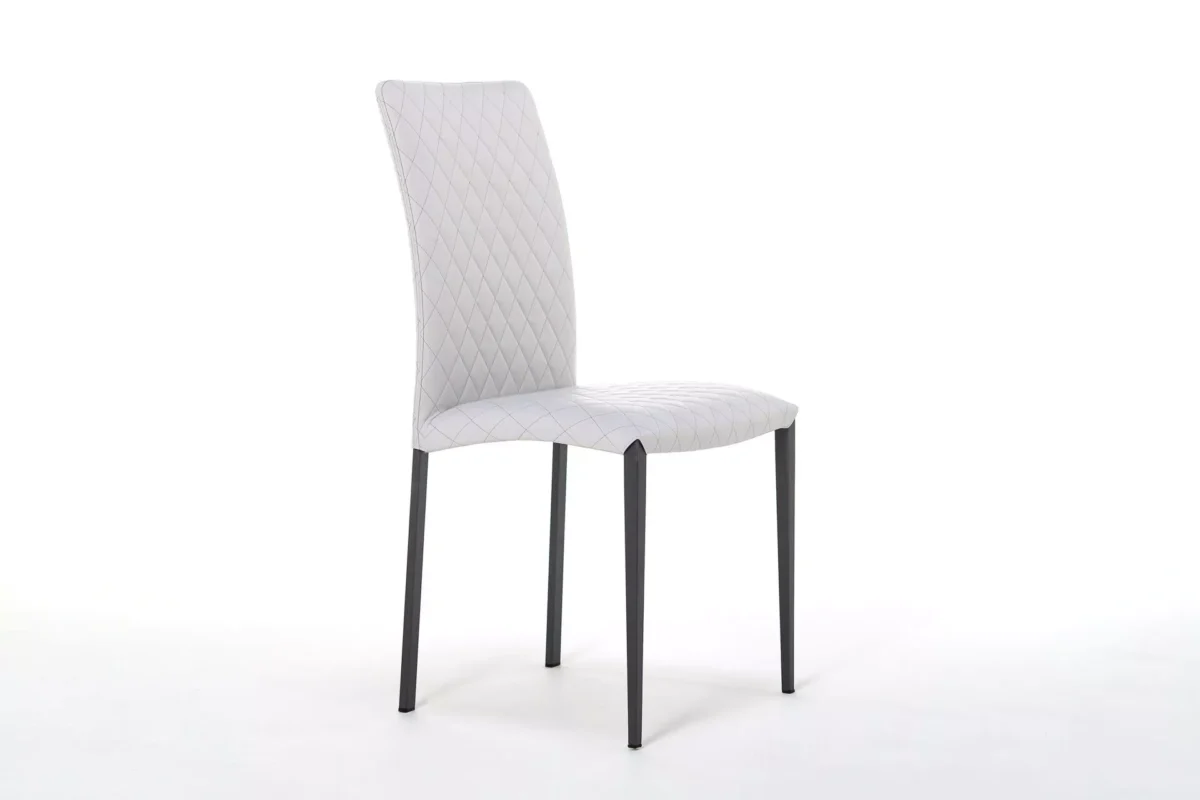 Roma 2 dining chair by Peressini with high quilted backrest and padded seat upholstered in soft grey fabric, set against a white background.