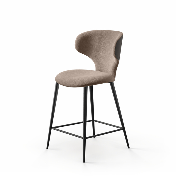 Luna W stool in beige fabric with gently curved backrest, cast‑iron gas‑lift column, and square stainless‑steel base on a showroom floor.