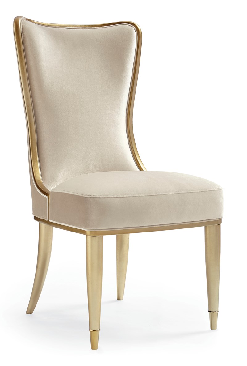 Sophisticates Dining Chair by Caracole — an elegant dining chair with upholstered seat and backrest in a refined fabric.