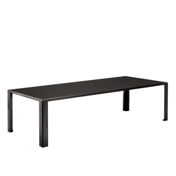 “BIG IRONY Table by Zeusnoto featuring a flat rectangular metal top with matching angular metal legs in a matte finish.”