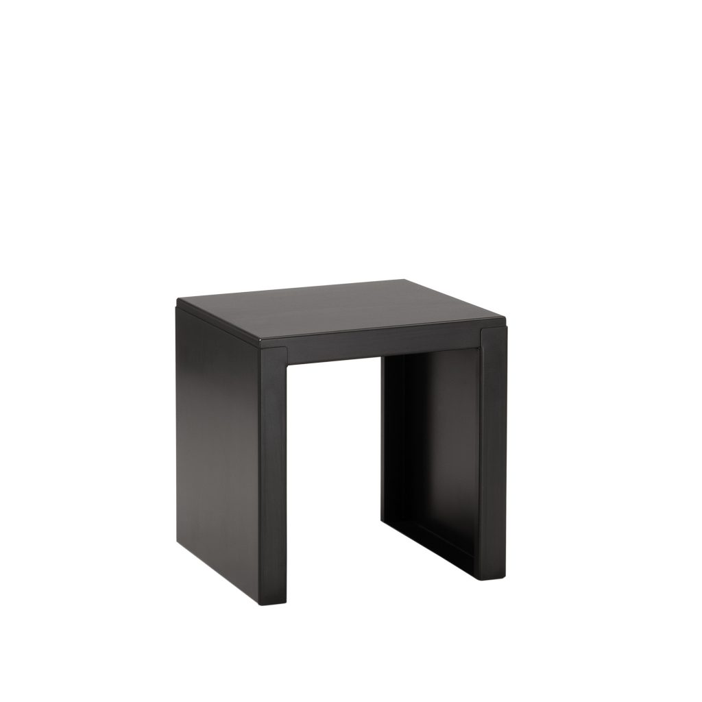 “BIG IRONY Stool by Zeusnoto featuring a large padded seat with sturdy metal legs in dark finish.”