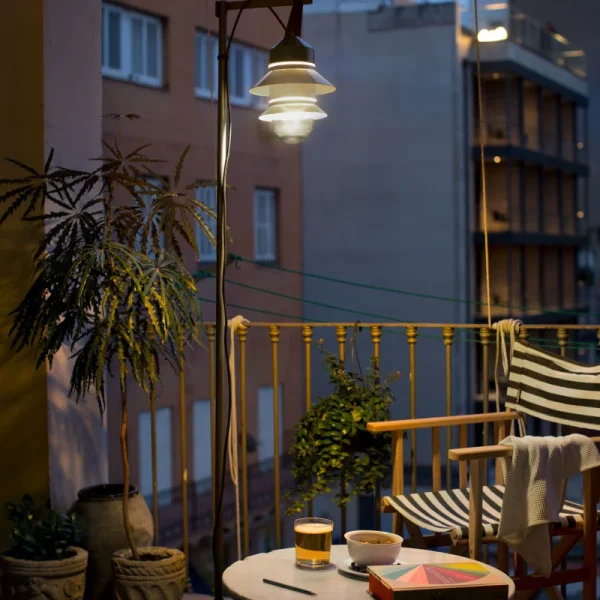 “Santorini by Marset ceiling-mounted outdoor light – elegant glass and metal fixture with coastal charm”