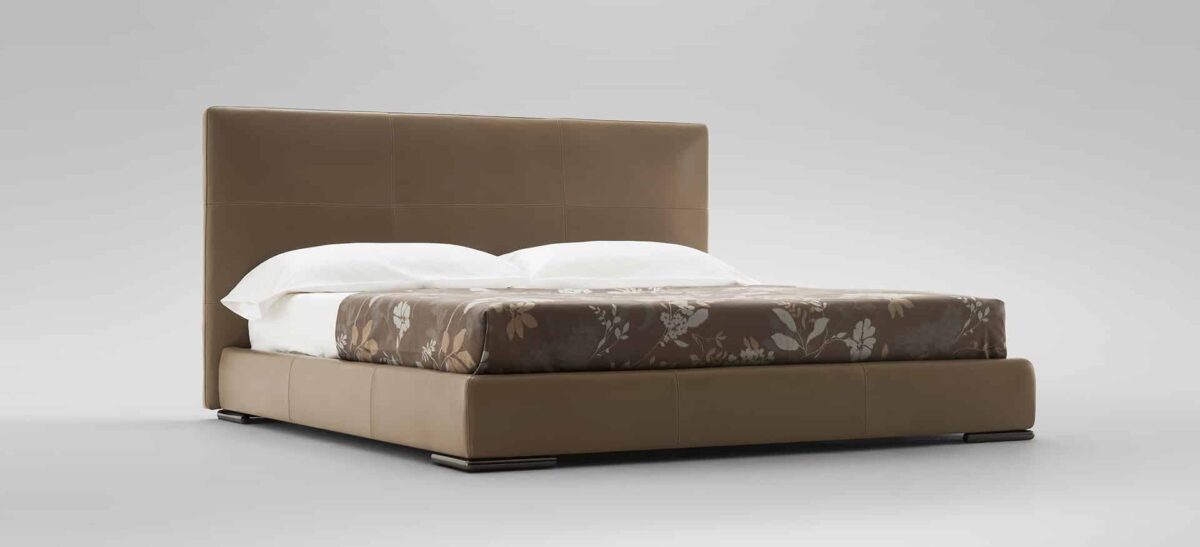 Modern upholstered platform bed with tall headboard by Camerich.