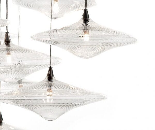 Luxurious Sirius lighting fixture with polished metal and crystal