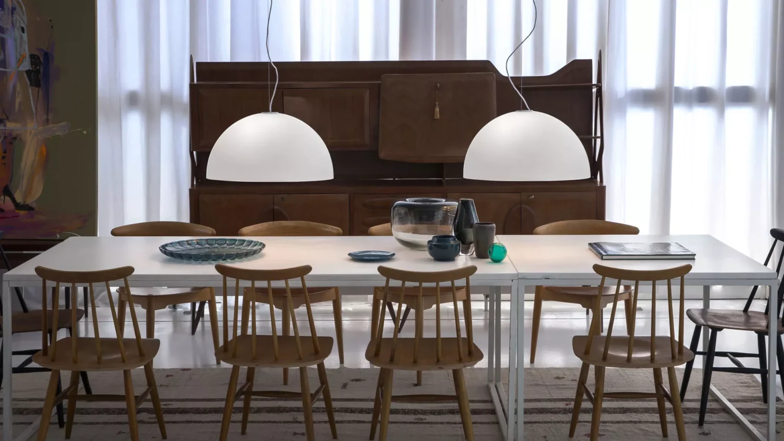 “Sonora by Oluce contemporary designer lighting – elegant floor lamp featuring directional light and polished metal finish”