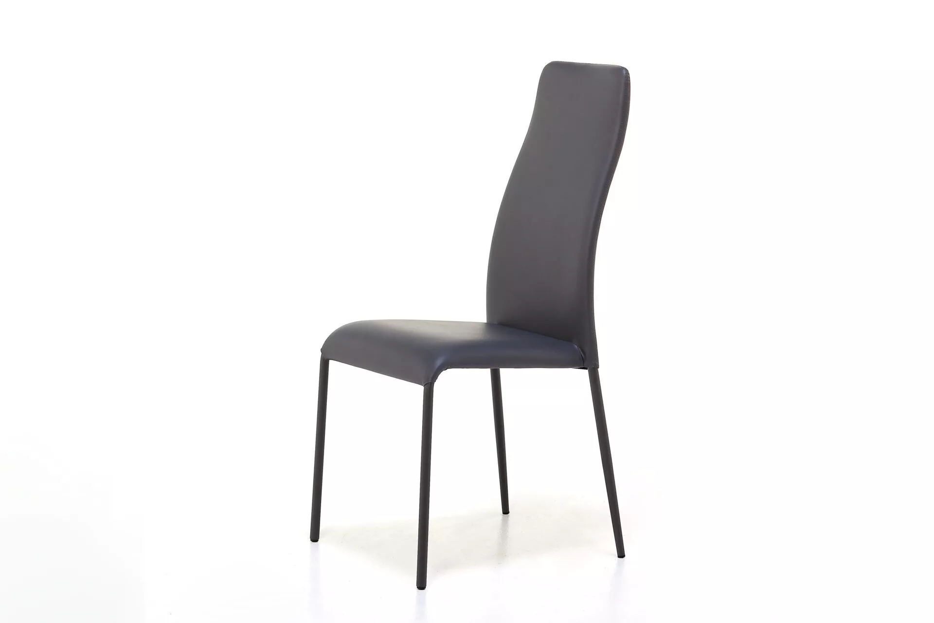 Swing 2H chair by Peressini with a gently curved backrest and slender metal legs, upholstered in neutral-tone fabric.