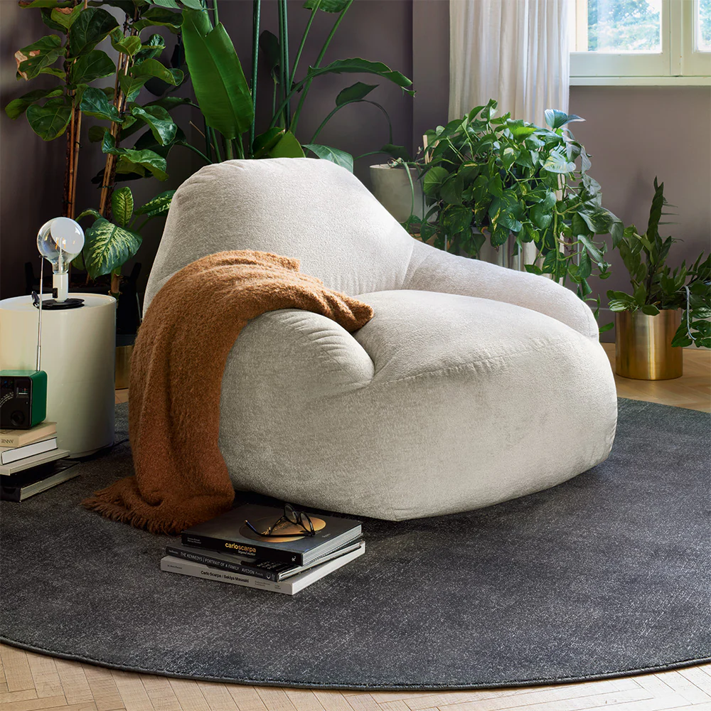 “TENDER by Connubia contemporary upholstered armchair – soft, rounded silhouette with Italian design and cozy fabric finish”