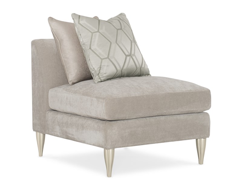 Caracole Fret Knot sectional with removable seat cushions and fluted feet, offering both style and comfort for modern living spaces.
