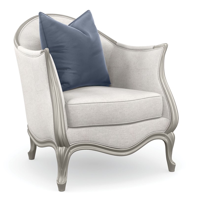 Special Invitation Chair by Caracole with plush cushioning and elegant wooden legs.