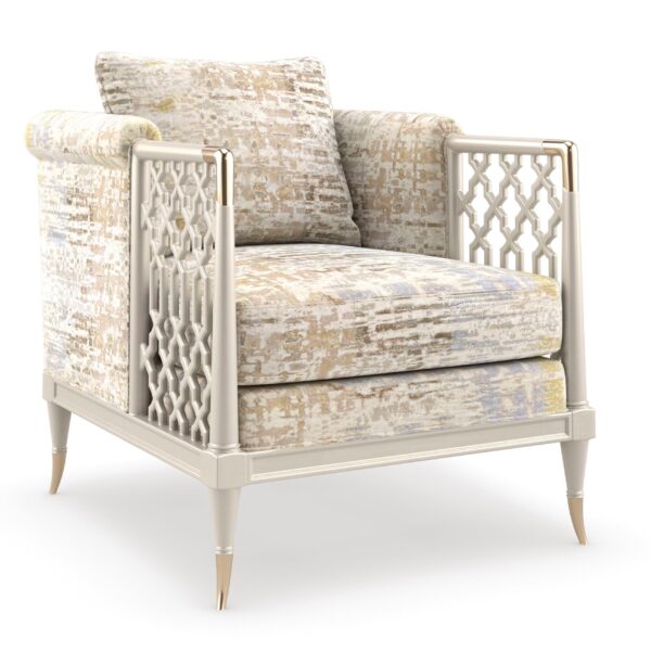 Elegant sofa featuring an exposed wood frame with carved lattice design on the arms, finished in Tuxedo Black with matte brass-plated accents, offering a luxurious seating experience.