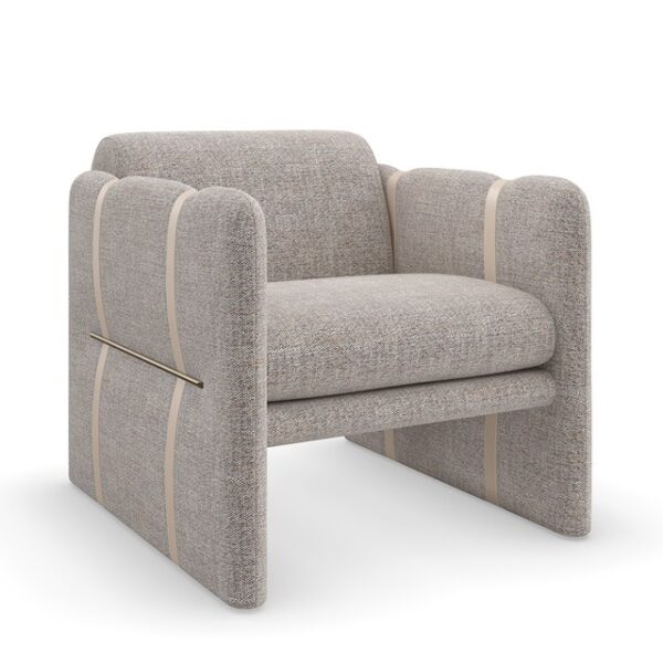 "Cigar Club Chair by Caracole featuring a soft-lined silhouette with an oversized bolstered back and sheltering arms cinched with faux leather straps, wrapped in a casual taupe and ivory textured woven fabric, complemented by metal bar accents in a Brushed Gold finish