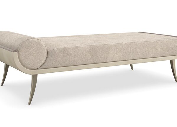 The seat and its integrated bolster pillow are meticulously tailored in a luxuriously soft velvet, providing immediate comfort and a plush look.