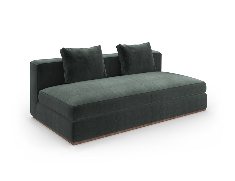 Caracole Bello armless sofa, fully upholstered in a luxurious fabric, resting on a Retro Walnut plinth base.