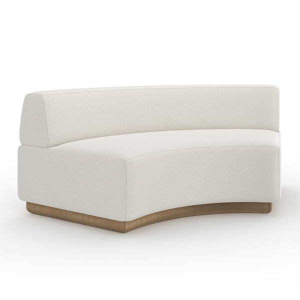 Caracole Crescent Armless Wedge featuring a fully upholstered tight seat and back, complemented by a Brushed Gold-painted base, offering a sleek and contemporary silhouette for modern interiors.