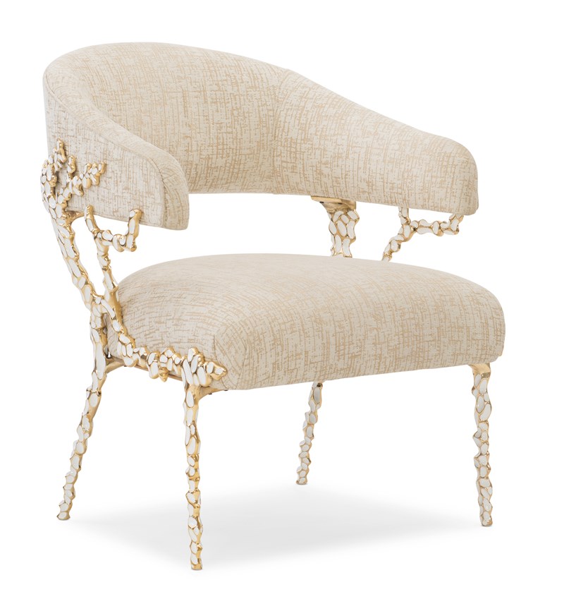 Sculptural accent chair featuring a custom-designed solid brass frame with white enamel inlay, finished in Gold Brush, resembling organic branches reaching toward the light