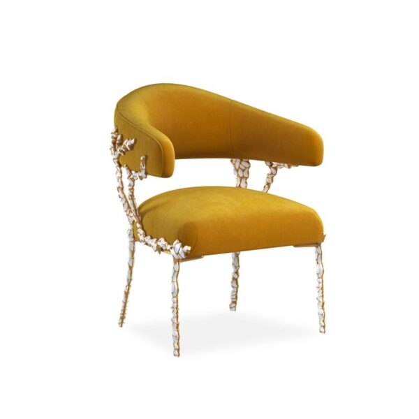Sculptural accent chair featuring a custom-designed solid brass frame with white enamel inlay, finished in Gold Brush, resembling organic branches reaching toward the light.