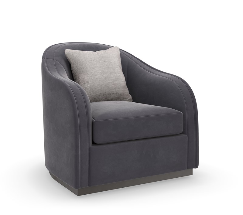 Modern accent chair featuring an enveloping silhouette with plush charcoal velvet upholstery, perfect for adding a touch of luxury to contemporary living rooms in Royal Oak, Michigan.