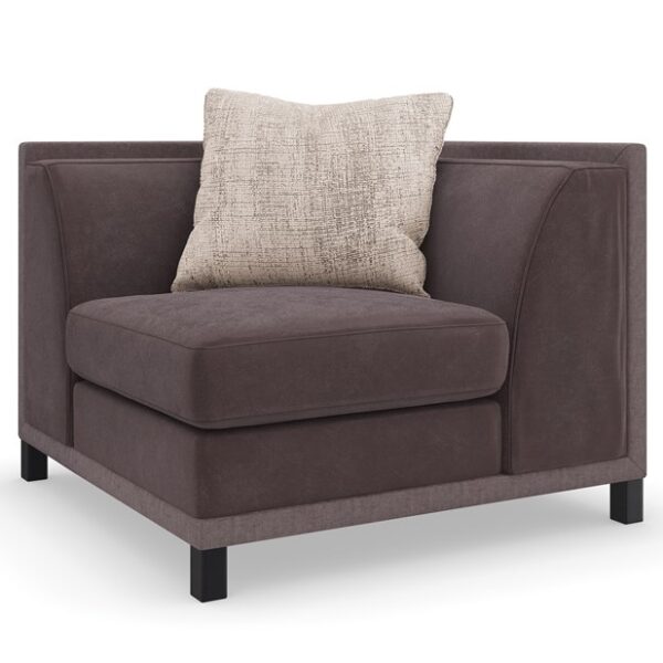 The Tuxedo Corner by Caracole is a sophisticated modular piece designed to complement the brand's classic shelter arm sectional. Featuring clean lines and crisp tailoring, it offers both style and versatility for modern living spaces.
