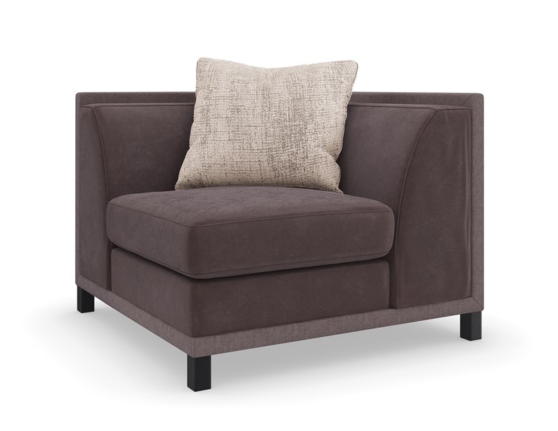 The Tuxedo Corner by Caracole is a sophisticated modular piece designed to complement the brand's classic shelter arm sectional. Featuring clean lines and crisp tailoring, it offers both style and versatility for modern living spaces.