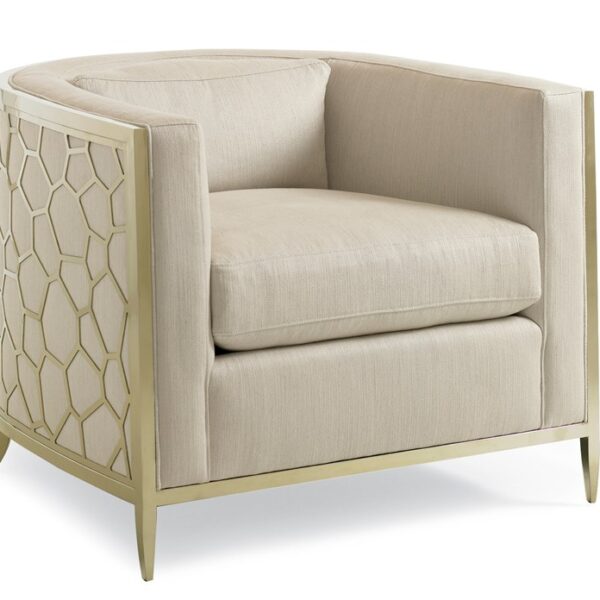Modern barrel-back chair featuring a custom-designed pierced metal frame with a honeycomb pattern, finished in Gold Bullion, and upholstered in off-white linen-blend fabric with a micro-herringbone design