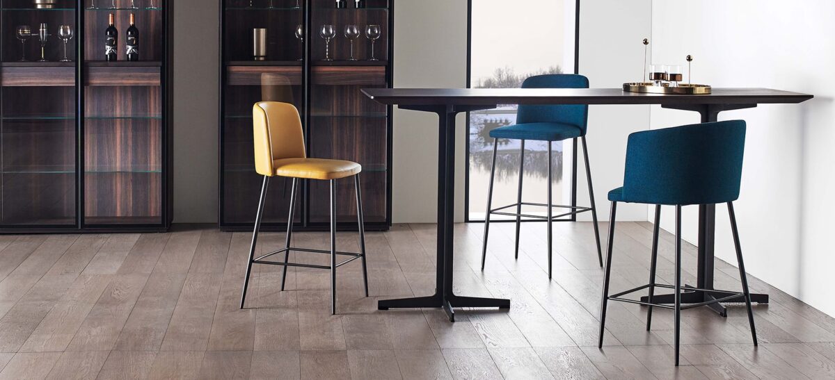 Vary Dining Table with minimalist profile and elegant wood finish by Camerich.