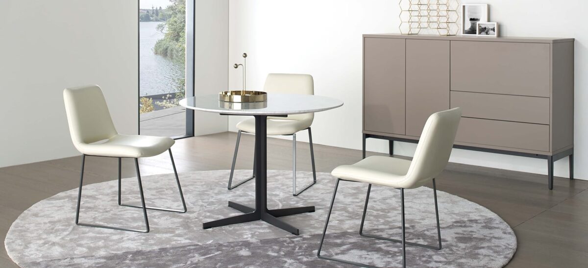 Stylish dining table with natural wood detailing and a metal frame by Camerich.