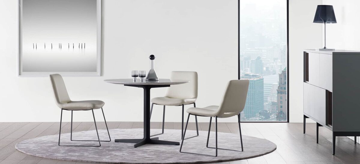 Vary Dining Table with natural wood finish and minimalist design by Camerich.